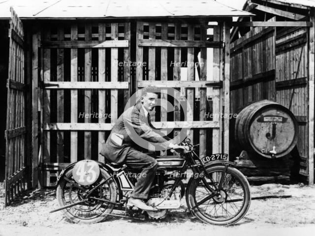 Billy Hollowell on a Norton OHV motorbike, 1922. Artist: Unknown