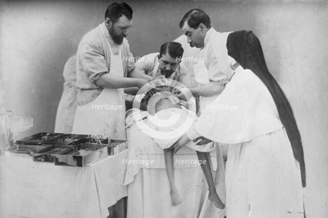 Binding arteries of Hindoo twins after operation, 1902. Creator: Bain News Service.