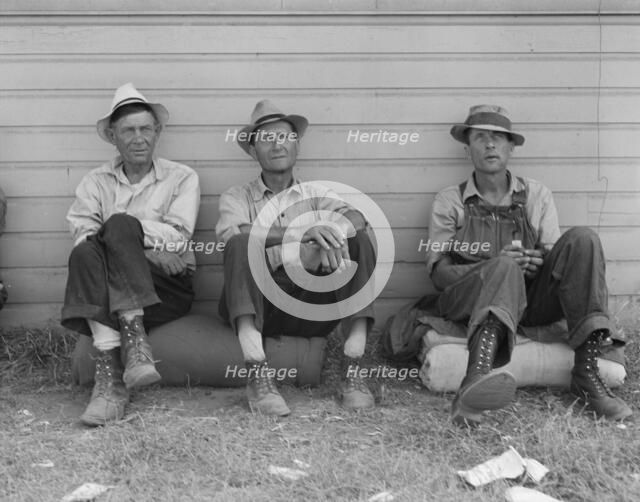 Bindle stiffs in town three weeks before opening of Klamath..., Tule Lake, Siskiyou County, CA, 1939 Creator: Dorothea Lange.