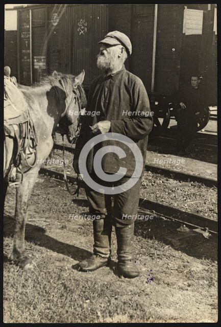 Bira station - Guide with a horse, 1929. Creator: Unknown.