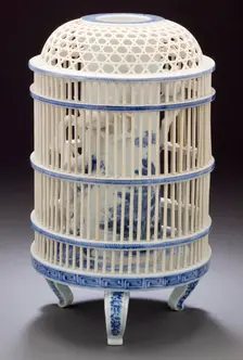 Bird in a cage, Late 19th century. Creator: Unknown