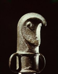 Bird-like mask used as a mount for the top of a staff