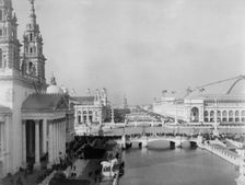 Bird's-eye view of exposition grounds, with canal in foreground, World's Columbian Expo..., 1893. Creator: Frances Benjamin Johnston