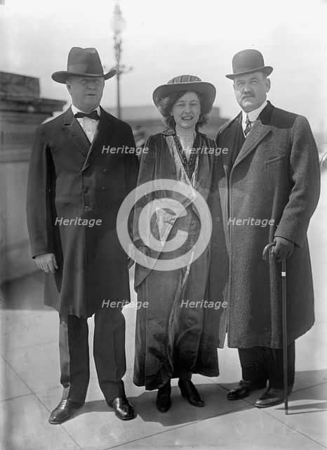 Bird Segle McGuire with Rep. J.S. Davenport, left, and Mrs. McGuire, 1913. Creator: Harris & Ewing.