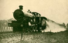 Birmingham Express Picking Up Water at Ruislip, Great Western Railway 1930. Creator: F. E Mackay