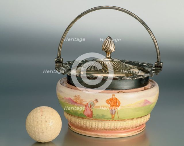 Biscuit barrel with golfing theme, Wood and Wood, c1893. Creator: Unknown.