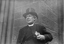 Bishop of Salisbury holding glasses and train schedule, 1910. Creator: Bain News Service
