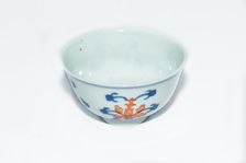 Blue and white cup with red enamel, 1908