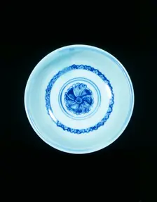 Blue and white hole in the bottom bowl with hibiscus scroll, Ming dynasty, China, 15th century. Creator: Unknown