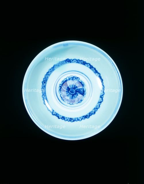 Blue and white 'hole in the bottom' bowl with hibiscus scroll, Ming dynasty, China, 15th century. Creator: Unknown.