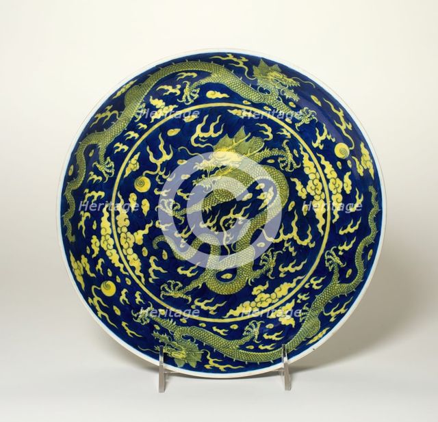 Blue-Ground Yellow-Enameled 'Dragon' Dish, Qing dynasty, Qianlong reign (1736-1795). Creator: Unknown.
