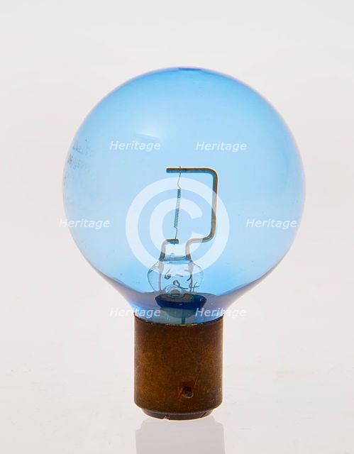 Blue headlamp bulb circa 1930. Creator: Unknown.