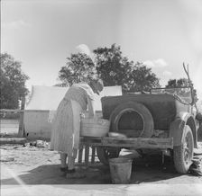 Blue Monday in a California migratory camp, 1936. Creator: Dorothea Lange