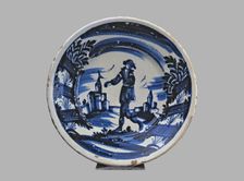 Blue plate with man and buildings, typical Catalan ceramics