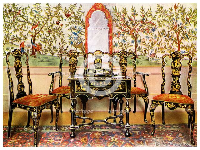 Black lacquer settee, chairs and table and red lacquer mirror, 1910.Artist: Edwin Foley