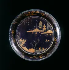 Black lacquer shallow round saucer, Qing dynasty, China, late 18th-early 19th century. Creator: Unknown