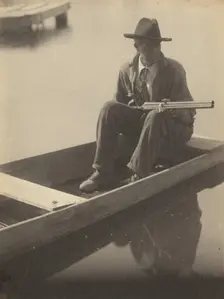 Black Man in Flat Boat, Holding Shotgun, 1929-1930. Creator: Doris Ulmann
