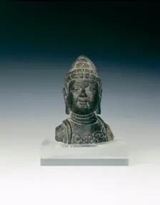 Black marble head of a Bodhisattva, China, 757-906 AD. Creator: Unknown