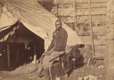 [Black Soldier in Camp], ca. 1863. Creator: Alexander Gardner