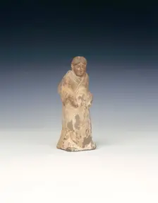 Black pottery figure of a lady, Six Dynasties period, probably Northern Wei, China, 5th century. Creator: Unknown