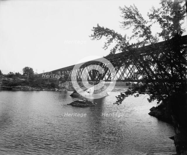 Black River Falls, Wis., railroad crossing, between 1880 and 1899. Creator: Unknown.