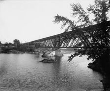 Black River Falls, Wis., railroad crossing, between 1880 and 1899. Creator: Unknown