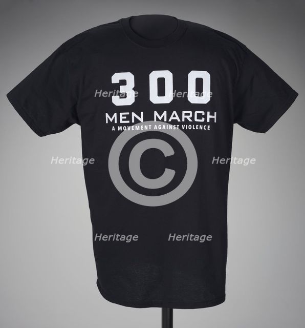 Black t-shirt for 300 Men March worn at a rally after the death of Freddie Gray, 2015. Creator: Gildan Activewear Inc..