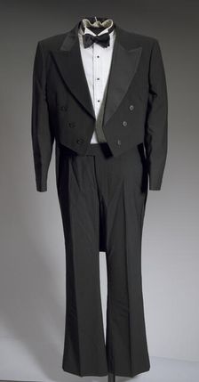 Black tail coat with white pocket handkerchief worn by Cab Calloway, 1976-1995. Creator: After Six