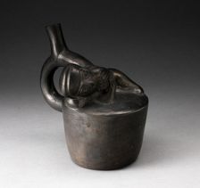 Blackware Handle Spout Vessel with Relief of a Reclining Musician with Pipes, 100 B.C./A.D. 500. Creator: Unknown