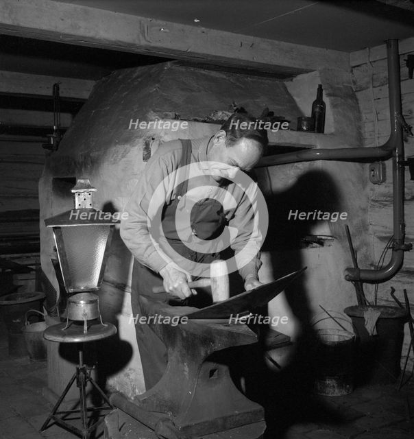 Blacksmith at work, Esklistuna, Södermanland, Sweden, 1960. Creator: Torkel Lindeberg.
