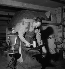 Blacksmith at work, Esklistuna, Södermanland, Sweden, 1960. Creator: Torkel Lindeberg