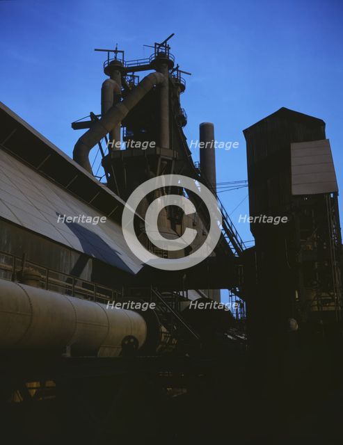 Blast furnace at Carnegie-Illinois Steel Corporation mill in Etna, Pennsylvania, 1941. Creator: Alfred T Palmer.