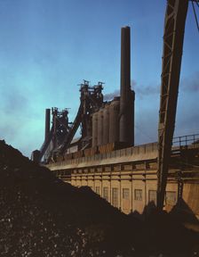 Blast furnaces and iron ore at the Carnegie-Illinois Steel Corporation mills, Etna, Pennsylvania, 19 Creator: Alfred T Palmer