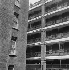 Block of flats with cast-iron railings along its balconies, Central London, 1955-1965. Creator: John Gay