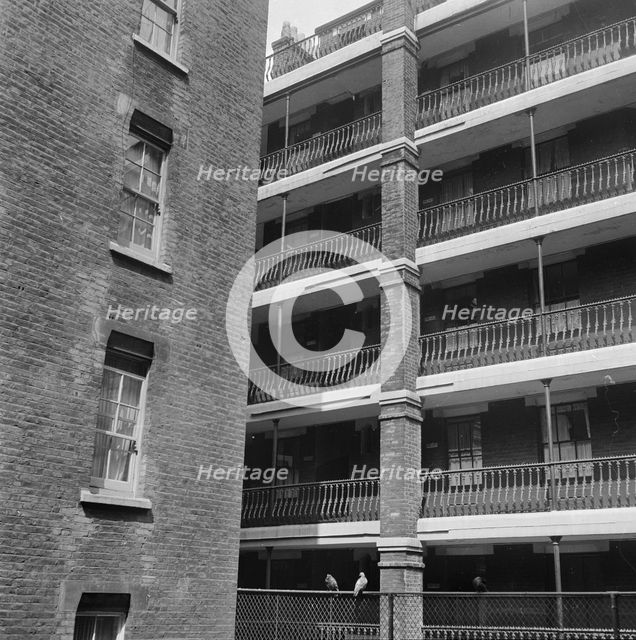 Block of flats with cast-iron railings along its balconies, Central London, 1955-1965. Creator: John Gay.