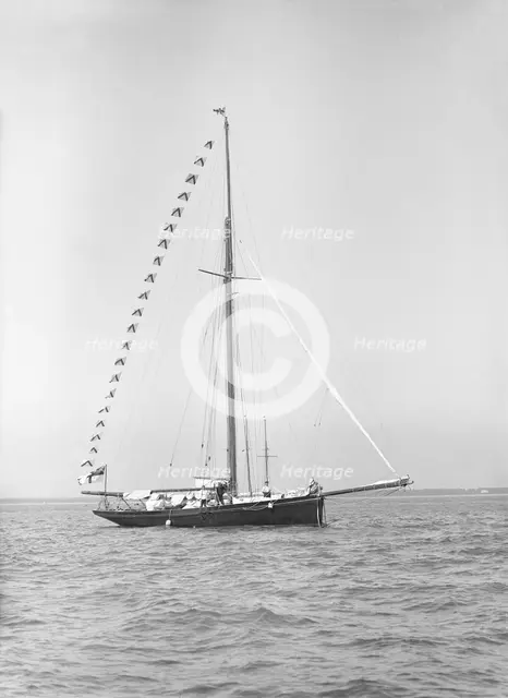 'Bloodhound' at anchor with flags, 1913. Creator: Kirk & Sons of Cowes.