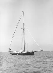 Bloodhound at anchor with flags, 1913. Creator: Kirk & Sons of Cowes