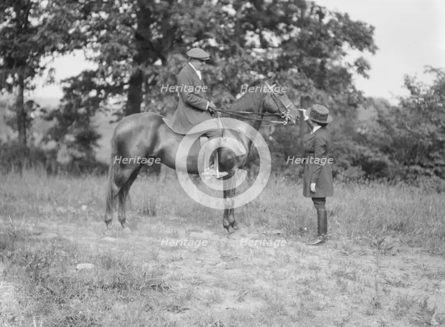 Bruce, J.M., Mr., on horseback, with Mrs. Bruce, 1919 May 30. Creator: Arnold Genthe.