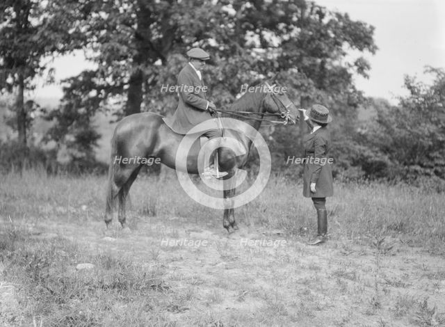 Bruce, J.M., Mr., on horseback, with Mrs. Bruce, 1919 May 30. Creator: Arnold Genthe.