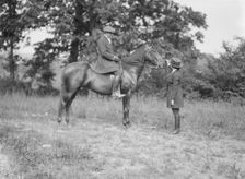 Bruce, J.M., Mr., on horseback, with Mrs. Bruce, 1919 May 30. Creator: Arnold Genthe