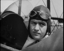 Bruno Mussolini, Son of Italian Leader Benito Mussolini, in Flying Cap Sitting in the..., 1937. Creator: British Pathe Ltd