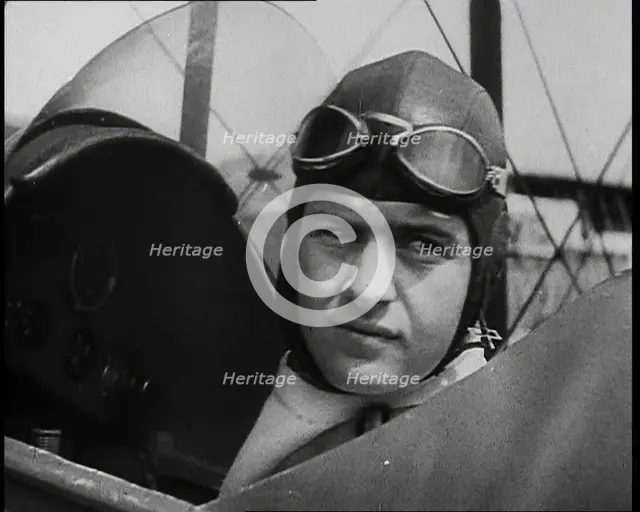Bruno Mussolini, Son of Italian Leader Benito Mussolini, in Flying Cap Sitting in the..., 1937. Creator: British Pathe Ltd.