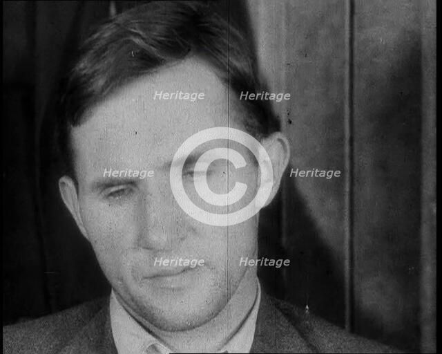 Bruno Richard Hauptmann Being Presented To the Press by the New York Police Department, 1930s. Creator: British Pathe Ltd.