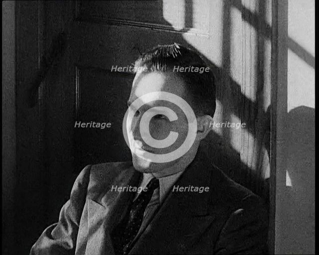 Bruno Richard Hauptmann Leaving the Courtroom After the Verdict in the Lindbergh's..., 1930s. Creator: British Pathe Ltd.