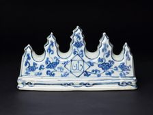 Brush rest with floral scroll and Arabic calligraphy, Ming Dynasty, Zhengde Period, 1506-1521