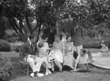 Brady, J.C., Mrs., group, seated outdoors, 1930 May 24. Creator: Arnold Genthe