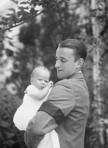 Brady, James Cox, Jr., Mr., and child, outdoors, 1930 May 24. Creator: Arnold Genthe