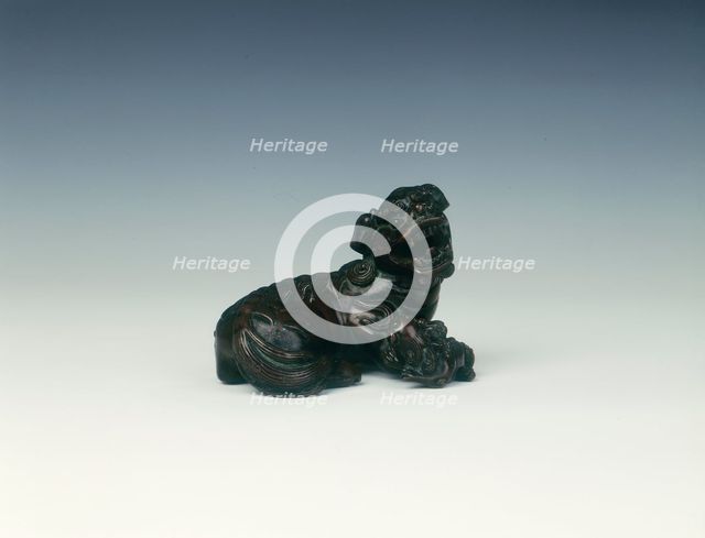 Brass Buddhist lion dog with offspring, late Ming to early Qing dynasty, China, 17th century. Artist: Unknown