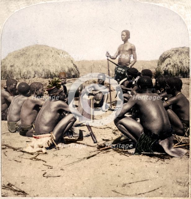 'Braves of a Zulu Village holding a Council, near the Umlaloose River, Zululand, S.A.', 1901. Artist: Unknown.