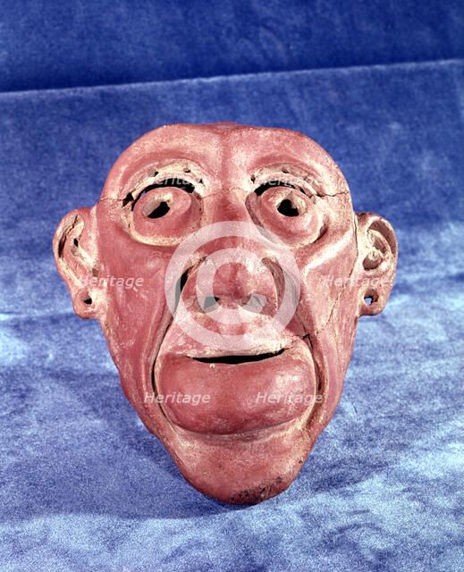 Brest mask made of clay of 14 cm in height, comes from the archaeological site of Tlatilco, in th…